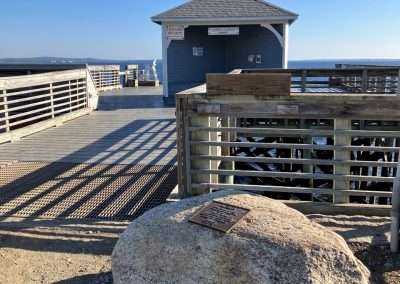 2023-12-07 Alfred J. Keith Wharf Dedication, submitted by Beverly Crofoot on behalf of the Bayside Historical Preservation Society. The Bayside, ME wharf dedication in 2001 is memorialized with a plaque on the causeway boulder reading: “AL KEITH (1923-2005); With gratitude for a half century of dedicated service to the Village of Bayside as harbormaster, wharfmaster, advisor, friend, frequent rescuer of boats and saver of lives; Presented by the Bayside Community; Summer of 2001.” Al Keith served in the U.S. Navy, in the Pacific, during World War II from 1942 to 1945. He graduated from the University of Maine at Orono in 1948, and owned Keith Shoe Company in Old Town for a few years before moving to Bayside where, for five years, he owned the Bayside Store. Al established Keith’s Marine Service, providing a mooring service for Bayside residents, and lobster fishing for more than 40 years. He served as overseer and treasurer of the Northport Village Corporation before becoming Village Manager. His biggest joy was serving as harbormaster for more than 45 years, where he met and enjoyed many people from all over the world. Al was generous with his time and energies within the Bayside community and was honored in 2001 at a celebration commemorating his 50 years of service to Bayside, where the wharf is now the “Alfred J. Keith Wharf.” Please consider joining the BHPS at https://www.baysidehps.org/index.php/donations/648/. #tbt #communityservice #memorial #memorialwharf #thewharf #penobscotbay @baysidehps #bhps #baysidemaine