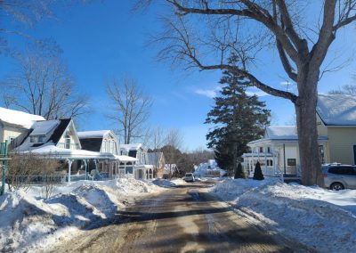 2025-02-18 It Doesn’t Look Like This in Summer, photographed on Broadway in Bayside, ME by Dan Webster. “Fewer cars, more piles of snow.” #notthesummer #snowbanks #broadway #cottagelife #baysidemaine