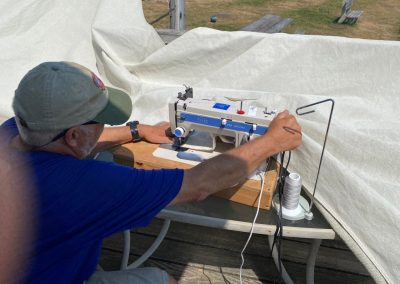 2025-08-08 Bayside’s Got Talent, photographed by Art Hall at the Northport Yacht Club in Bayside, ME. “Chris Lewton works his magic on repair to the yacht club sun awning. Thanks, Chris!” @nyc_bayside #sewing #awning #awningrepair #communityservice #baysidemaine