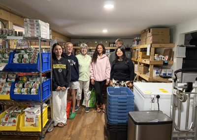 2025-10-15 Stocking the Shelves, photographed at the Northport (ME) Food Pantry as five wonderful Bayside teens helped Patti Wright stock the shelves one morning in August after the Fill Our Hall Food Drive. Donations of food and money to help the pantry continue to fill its shelves are always happily accepted. Contact Patti Wright (northportfpantry@gmail.com) to make arrangements for a pickup or drop-off, or mail a donation check (payable to Northport Food Pantry, PO Box 27, Lincolnville, ME 04849). #northportfoodpantry #foodpantry #fooddrive #fillourhall #fillthehall #communityservice #communityhall #northportmaine #baysidemaine