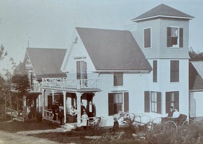 2025-11-13 Carriages and a Full Porch, submitted by Beverly Crofoot on behalf of the Bayside Historical Preservation Society (www.baysidehps.org). The photo is labeled September 1896 and shows the Charles Miles Cottage at 10 Maple Street in Bayside, ME. Beverly provides the following transcription from the reverse side of the mat: “Charles & Dudley Miles were born in Newburgh, sons of Dudley and Sarah B (Leavett) who was daughter of William & Judith Bickford Leavett = Charles’ gt grandson was Amos W Kimball of Newburgh - reframed fake idc 1996.” The following is handwritten on the back of photograph itself: “Sept 1896; Charles Miles Cottage Northport. L to R: Mary (Toothaker) Miles (Mrs Dudley R Miles); Annie Ida Miles; Little boy Standing; Stella M (Miles) Loud (Mrs Amos W Knowlton, Seated; Mary Miles by Post - Mrs Charles Miles; Charles Miles; Nellie (Dau of Charles & Mary); Baby in carriage; Little boy Dudley in Cart; Dudley R Miles bro of Charles in wagon; Mary F Miles, dau of Dudley and Mary in wagon.” Please consider joining the BHPS at https://baysidehps.org/. #tbt #cottagelife #porchlife #carriages #earlytransportation #oldbayside @baysidehps #bhps #baysidemaine
